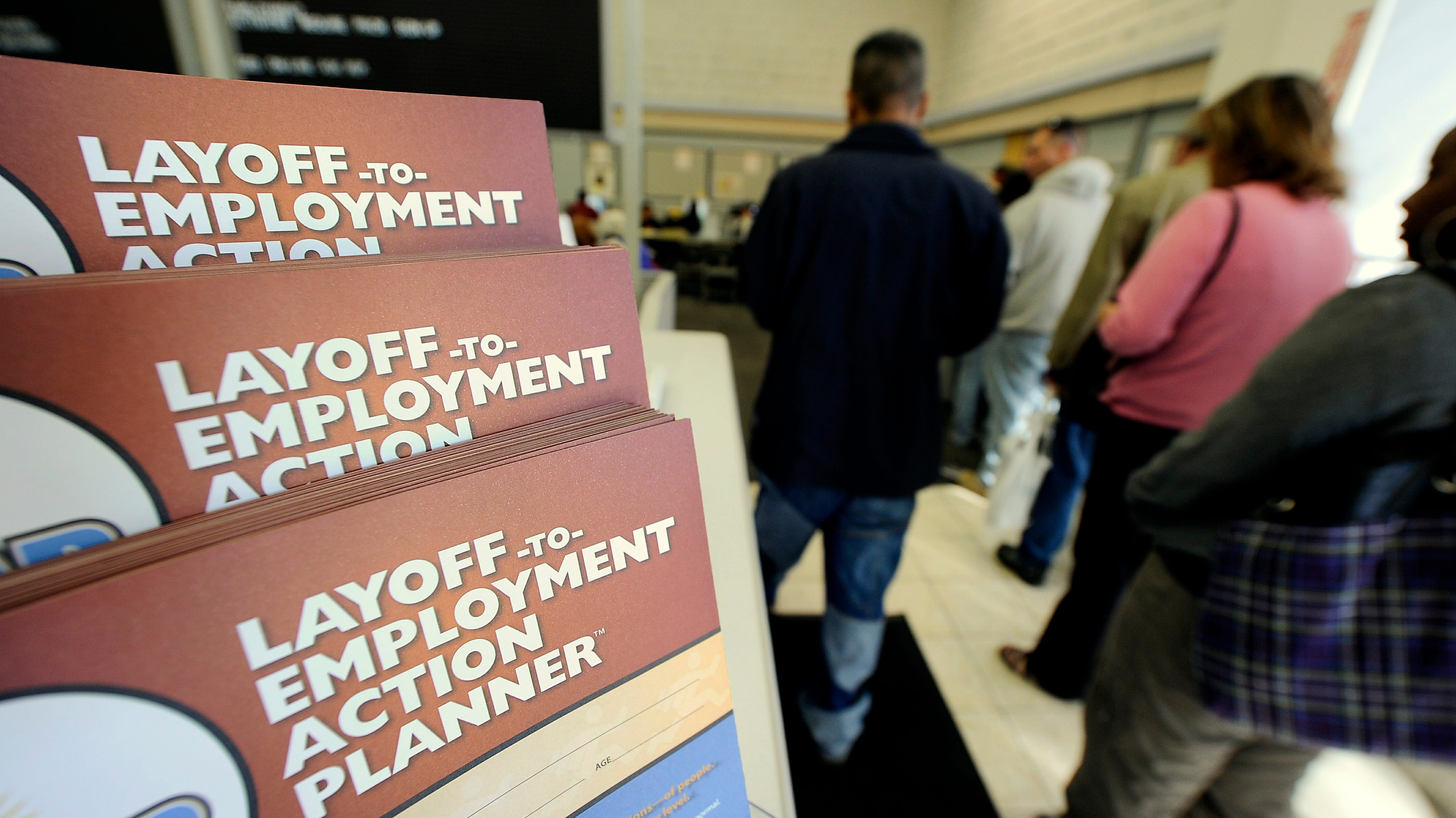 Jobless claims fall 15,000 to 330,000