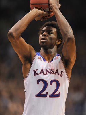 Kansas guard Andrew Wiggins (22) shoots a free throw during the first half of the game against the Pittsburg State Gorillas at Allen Fieldhouse.
