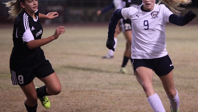 La Quinta's Kailee Prescott (9) carries the ball during a home match with Cathedral City on Tuesday. 