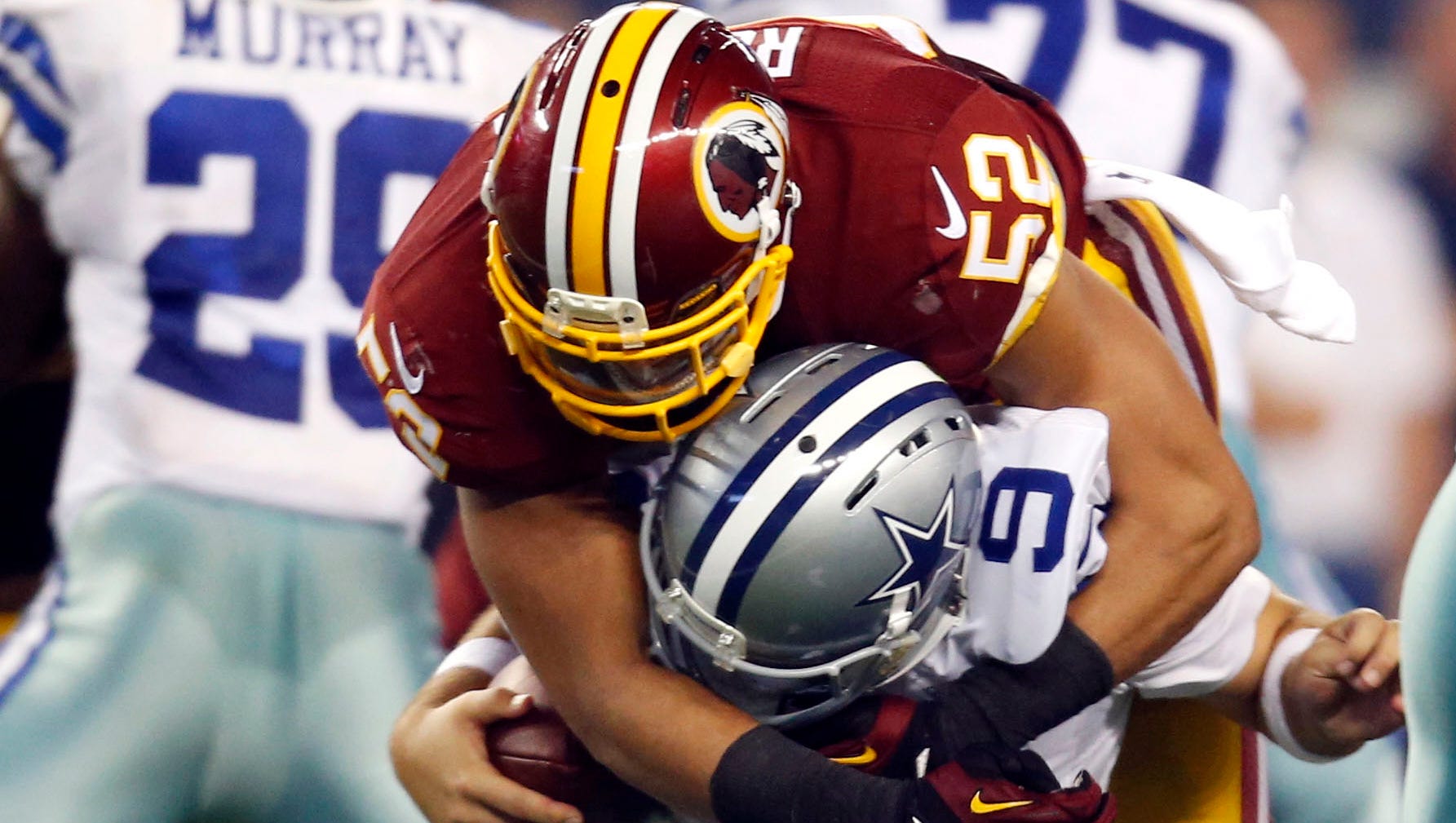 Tony Romo suffers back contusion in Cowboys' loss