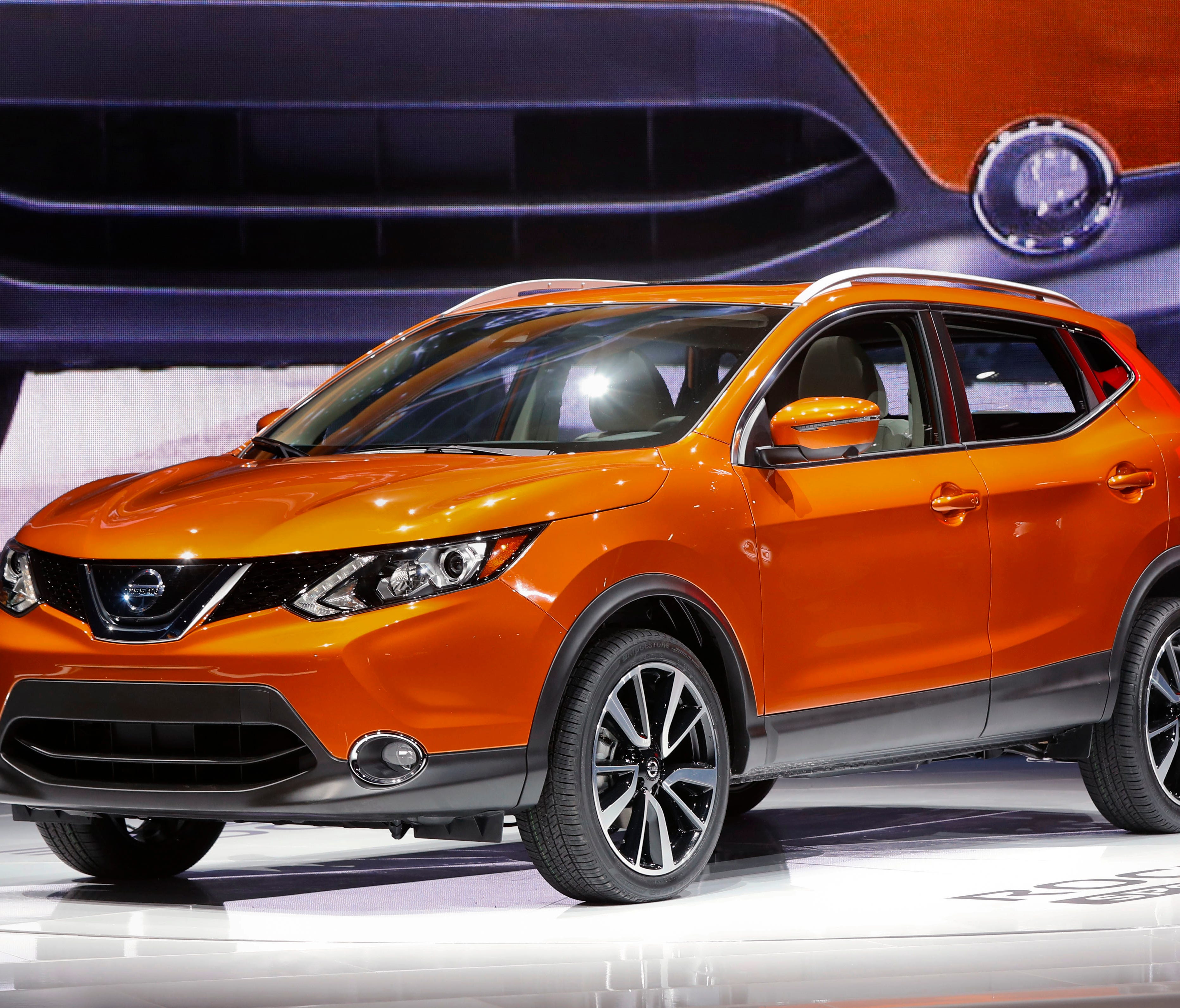 The 2017 Nissan Rogue Sport is on display at the North American International Auto Show in Detroit. The alliance of Japanese automaker Nissan Motor Co. and Renault SA of France says it led in global vehicle sales for the first half of this year, the 