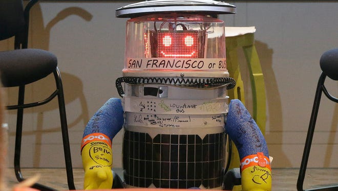 HitchBOT, a hitchhiking robot, is formally introduced to an American audience, during a program at the Peabody Essex Museum Thursday, July 16, 2015, in Salem, Mass.