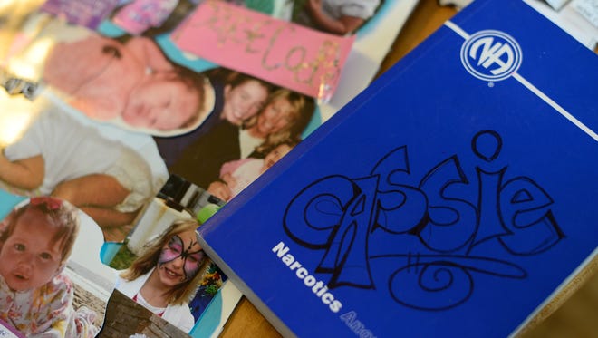Some of Cassie Nygren’s belongings from her time in prison include a narcotics anonymous book and a poster she made while in Wisconsin’s Earned Release Program.
