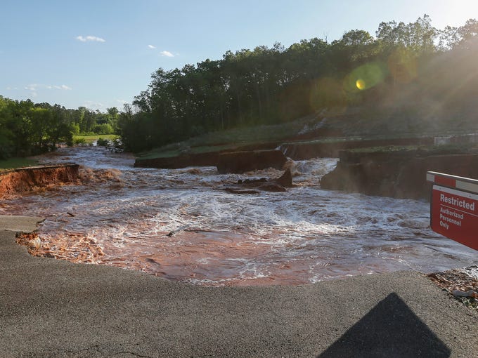 'Devastated’ by flood, Missouri town begins cleanup