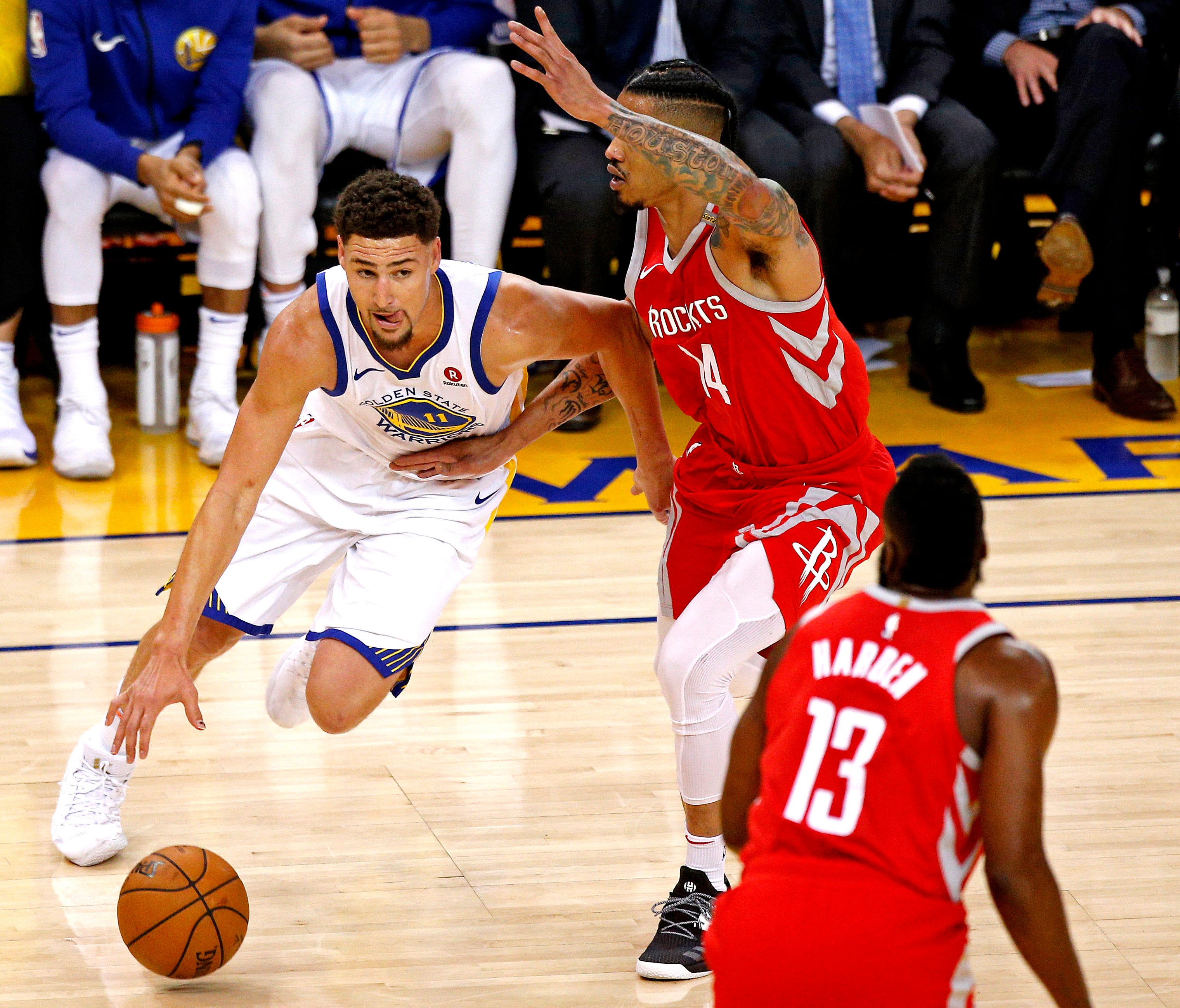Golden State Warriors guard Klay Thompson (11) drives to the basket against Houston Rockets guard Gerald Green (14) during the first quarter in game six of the Western conference finals of the 2018 NBA Playoffs at Oracle Arena.