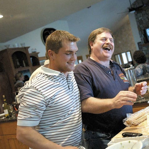 Capt. Rick Quashnick, right, with boat engineer...