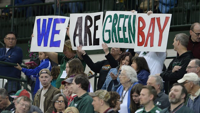 UWGB fans show their pride during the 2015 Horizon League tournament championship game at the Kress Center in Green Bay.