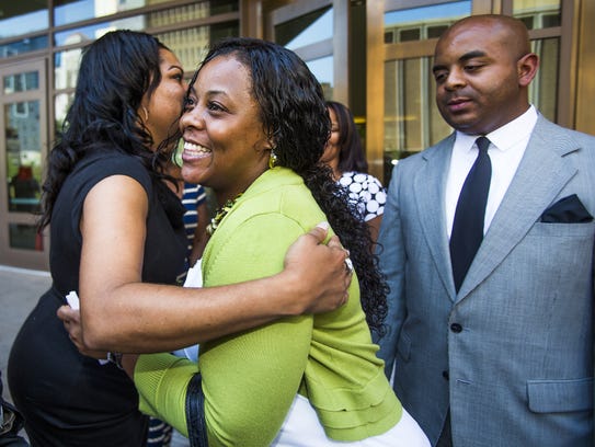 Shanesha Taylor is hugged after being released from