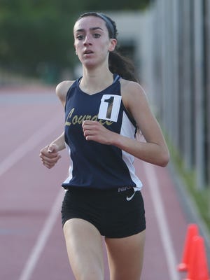 Lourdes Caroline Timm on her way to winning the 1600 during the Section 1 State Track and Field Qualifier at White Plains High School June 2, 2017.
