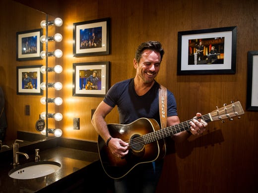 Charles Esten poses in his dressing room at the Grand