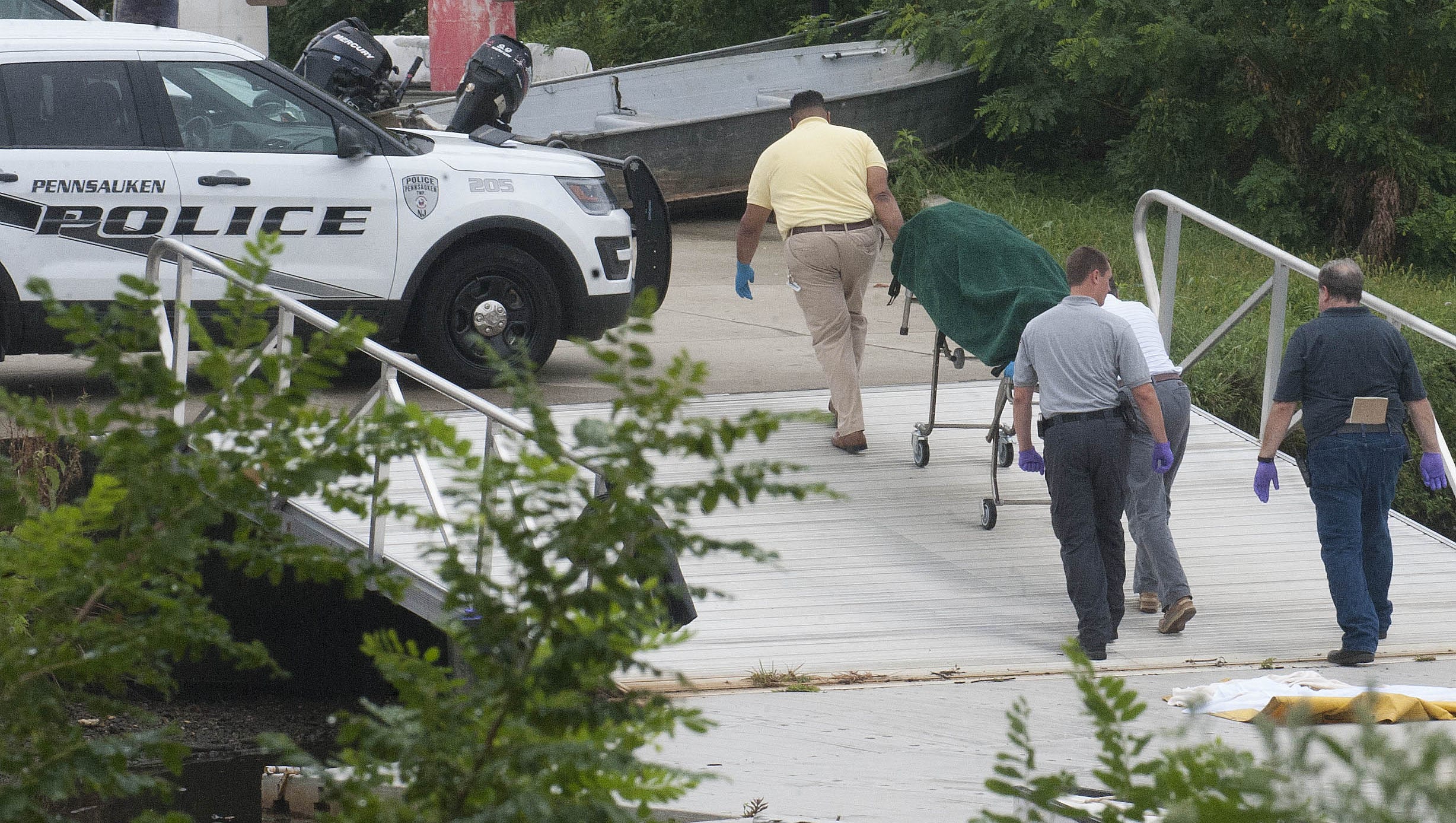 Authorities work to ID body found in Cooper