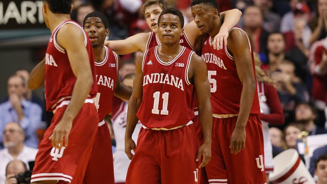 Hoosiers James Blackmon Jr., Robert Johnson, Collin Hartman, Kevin Yogi Ferrell and Troy Williams pulled together for a win over the Bulldogs. Indiana and Butler faced off in the first game of the Crossroads Classic at Bankers Life Fieldhouse Saturday, December 20, 2014.