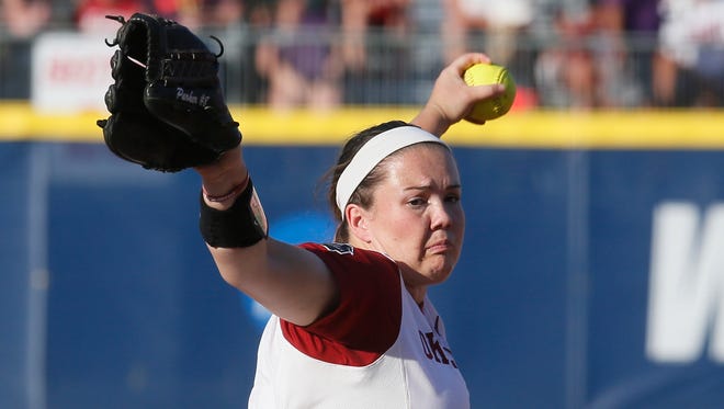 Oklahoma's Paige Parker pitches against Auburn during the third inning of the deciding game of the championship series of the NCAA softball College World Series, Wednesday, June 8, 2016, in Oklahoma City.(AP Photo/Sue Ogrocki)