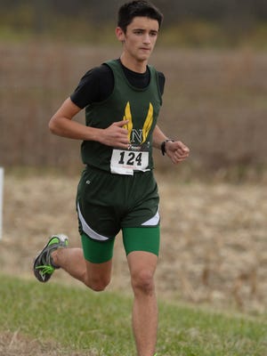 Gabe Beatty leads the annual Turkey Chase 7k Saturday, Nov. 21, 2015, in Centerville.