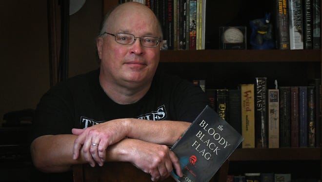 Steve Goble, a longtime News Journal employee, has written his first novel, "The Bloody Black Flag: A Spider John Mystery."