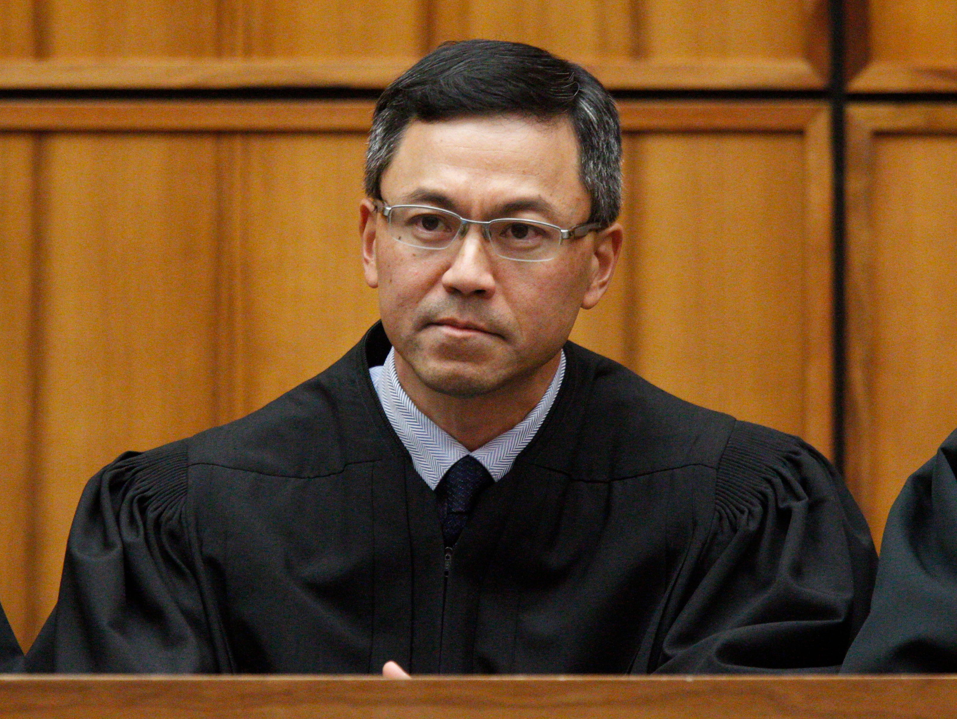 This December 2015 photo shows U.S. District Judge Derrick Watson in Honolulu. The judge blocked President Trump's revised travel ban on March 15, 2017, hour before it was to take effect.