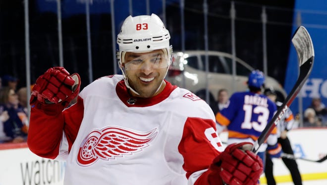 Trevor Daley celebrates after scoring a goal in the third period of the Red Wings' 6-3 win over the Islanders on Tuesday, Dec. 19, 2017 in New York.