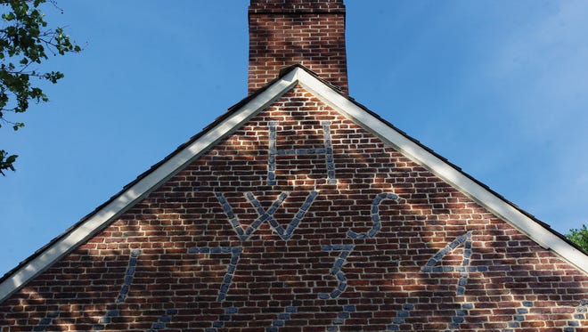 The initials of owners William and Sarah Hancock can be seen in the brickwork of the Hancock House in Lower Alloways Creek.