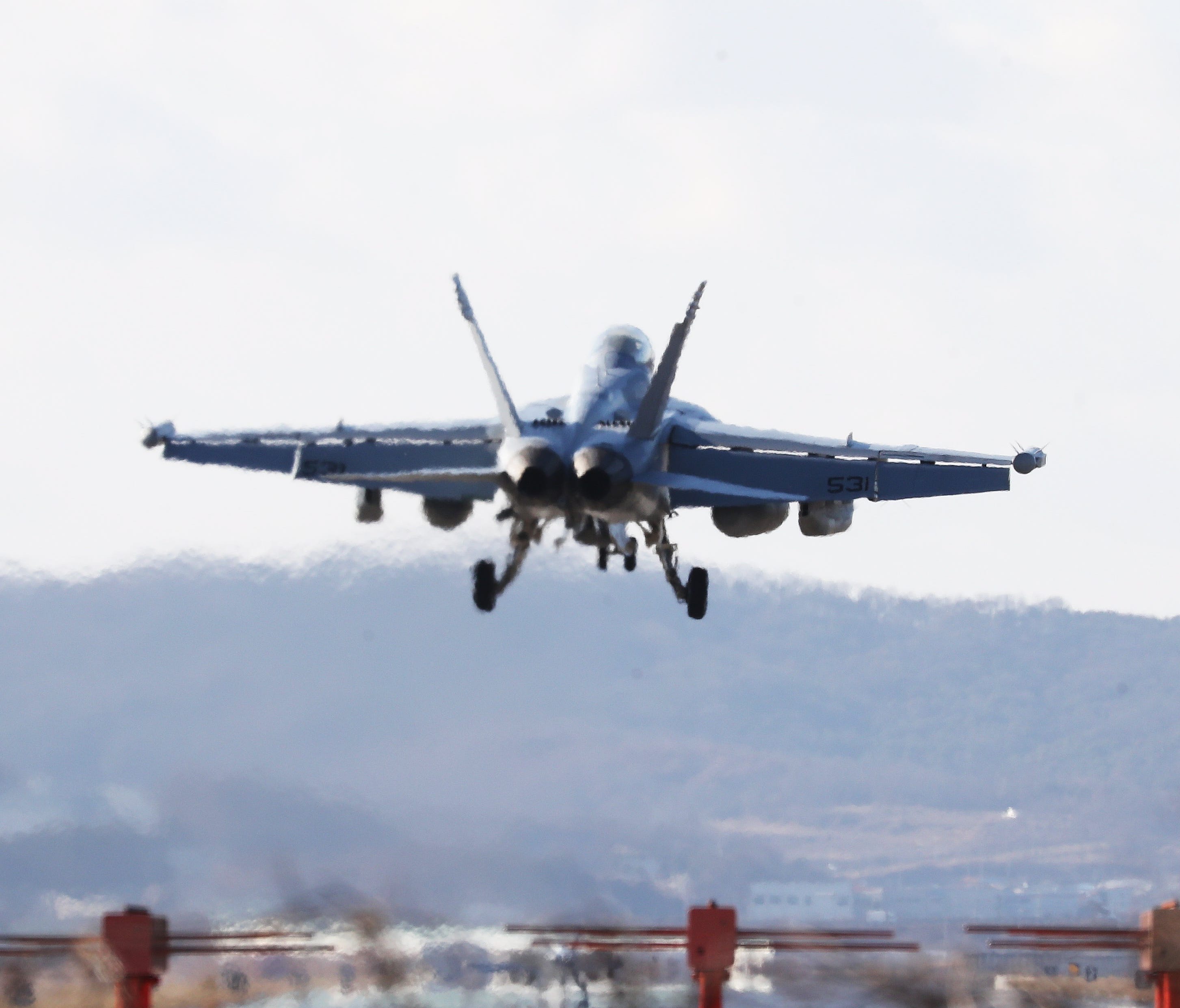 An American EA-18G Growler electronic warfare aircraft lands after completing a Korea-U.S. air force drill, at Osan Air Base in Pyeongtaek, South Korea, Dec. 4, 2017.