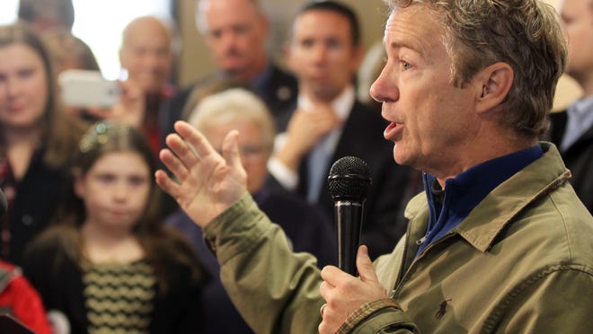 Sen. Rand Paul has several possible paths to choose to get around Kentucky’s ban on running for more than one statewide office on the same ballot. Paul is seen here at a Mitch McConnell rally this year at Cincinnati/Northern Kentucky Airport.