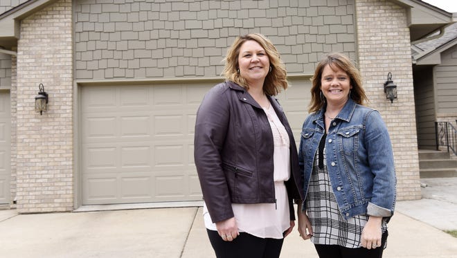 Jill Redmond and Beth Gebauer formed a real estate team at Ameri/Star after their employer, Capital One, announced it was closing in Sioux Falls.