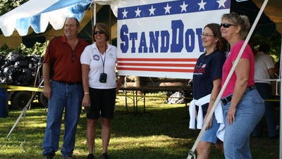 Some of the event organizers from the Bellevue Vets and Bellevue Vets Ladies Auxillary pose for a picture outside one of the booths at the event in 2011.