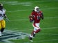 James Harrison of the Steelers gives chase but cannot catch Larry Fitzgerald as he nears the end zone for a touchdown