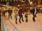 The ice skating ring on Market Square was full at the