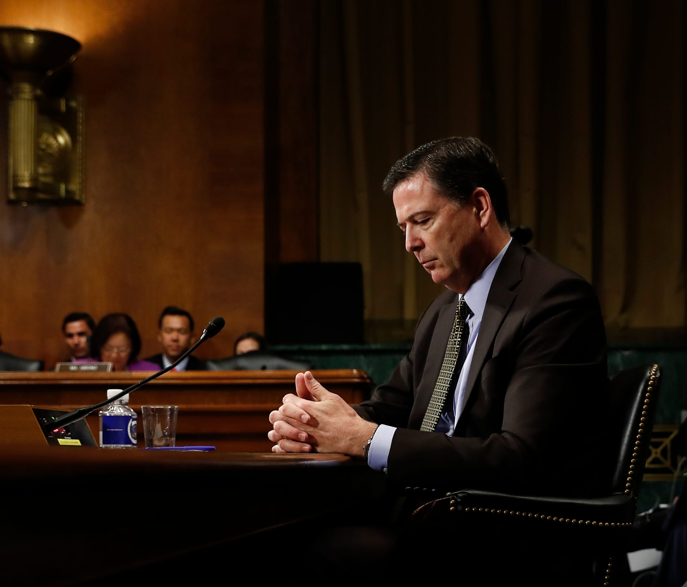 James Comey pauses as he testifies on Capitol Hill on May 3, 2017.