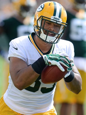 Packers tight end Richard Rodgers runs after a catch Sundayduring training camp practice at Ray Nitschke Field.