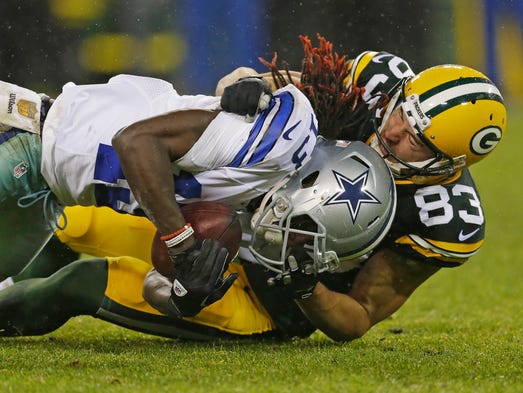 Green Bay Packers wide receiver Jeff Janis (83) tackles