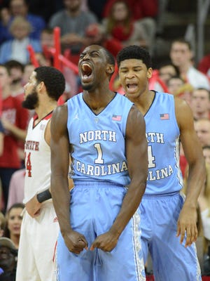 North Carolina Tar Heels forward Theo Pinson (1) reacts after a basket during the first half against the North Carolina State Wolfpack at PNC Arena.