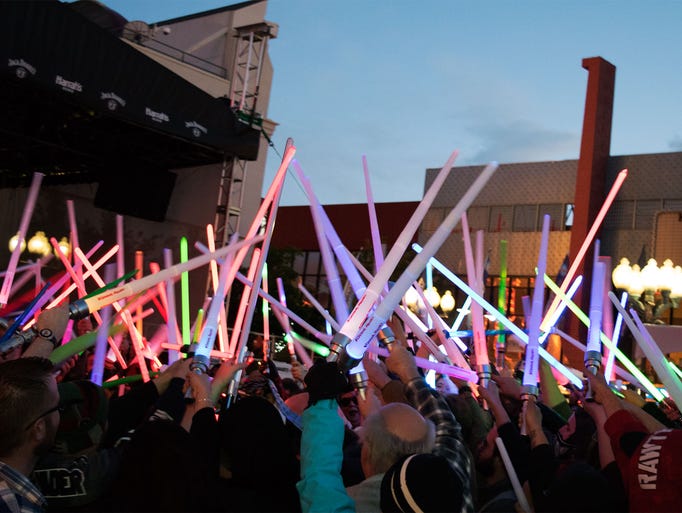Lightsabers are raised high as the battle draws to