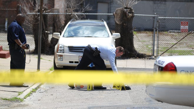 Initial reports indicated that two men in West End were shooting at each other in the street Thursday afternoon.