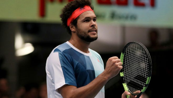 Jo-Wilfried Tsonga of France reacts after wining his semi final match against Ivo Karlovic.