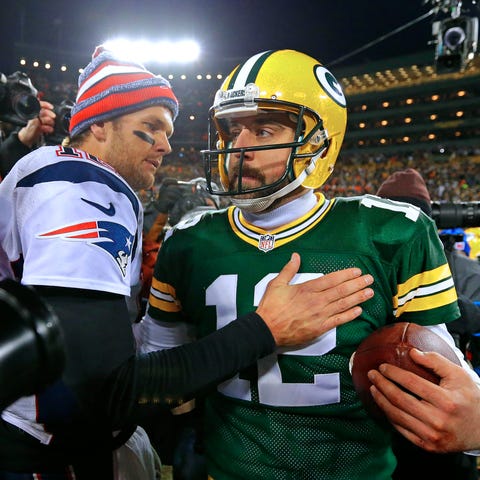 Packers quarterback Aaron Rodgers and New England 