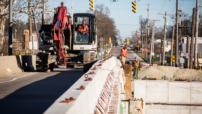 The East Jackson Street bridge over the White River, shown in a file photo from November 2017, is limited to one lane for traffic while it is rebuilt one half at a time, a project that won't be complete until 2020.