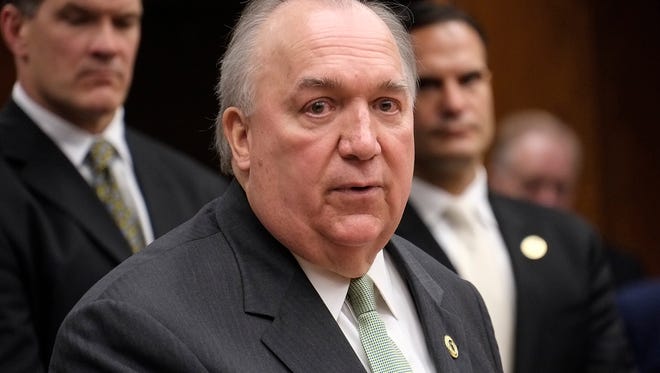 Former Michigan governor John Engler speaks at the Michigan State University Board of Trustees meeting after being selected to be the interim president of the university Wednesday, Jan. 31, 2018.