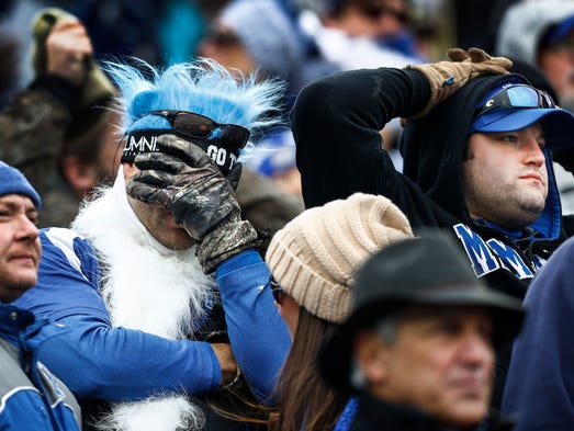 Dejected Memphis fans watch the final minutes of a