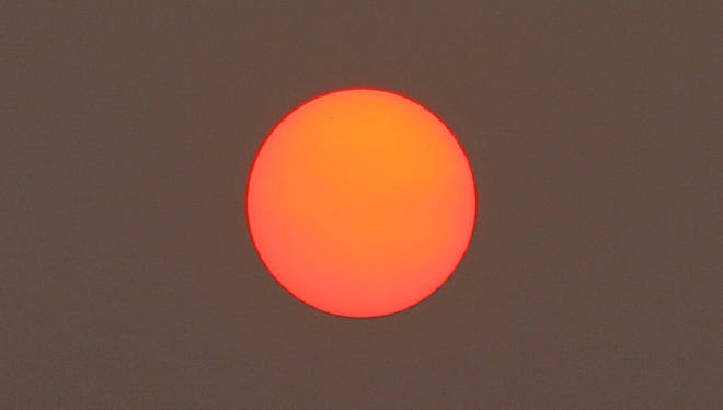 Photo of a red sun taken in Iowa in 2015.