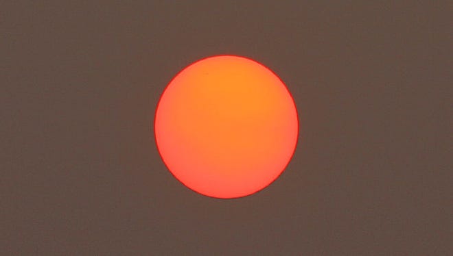 Meteorologist Explains Why The Sun Looks Particularly Red Right Now