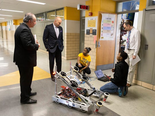 From top left, Henry Ford High School Principal Michael