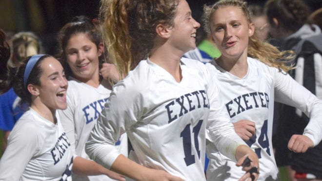 Exeter players, including Sabrina Sherman, Ella Fraser, Elisa Delgado and Kate Heslop react during a Division I girls soccer game at Londonderry High School last fall.
