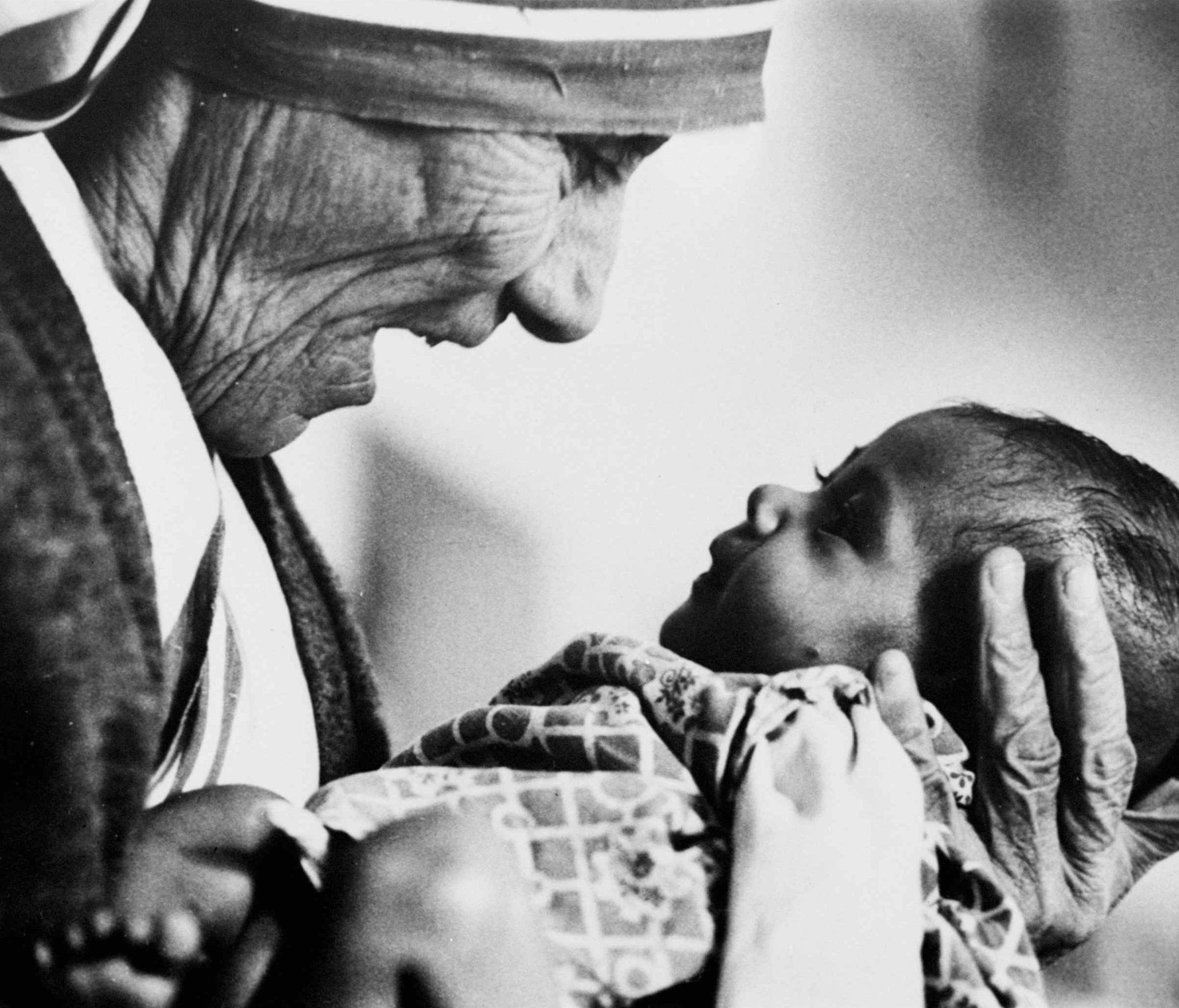 Mother Teresa, cradles a baby in a this 1979 file photo.