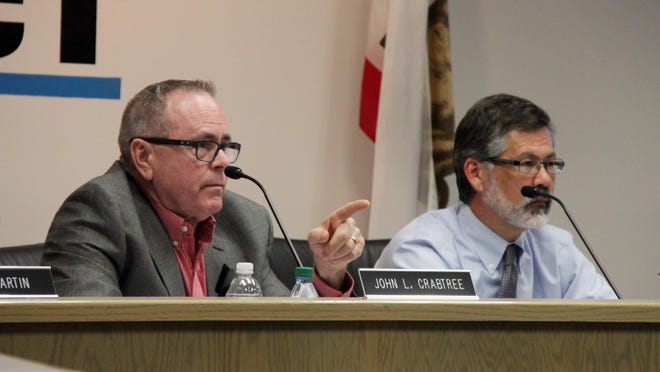 John Crabtree, Visalia Unified board president, and Todd Oto, superintendent, adress members of the public at a special meeting Thursday night.