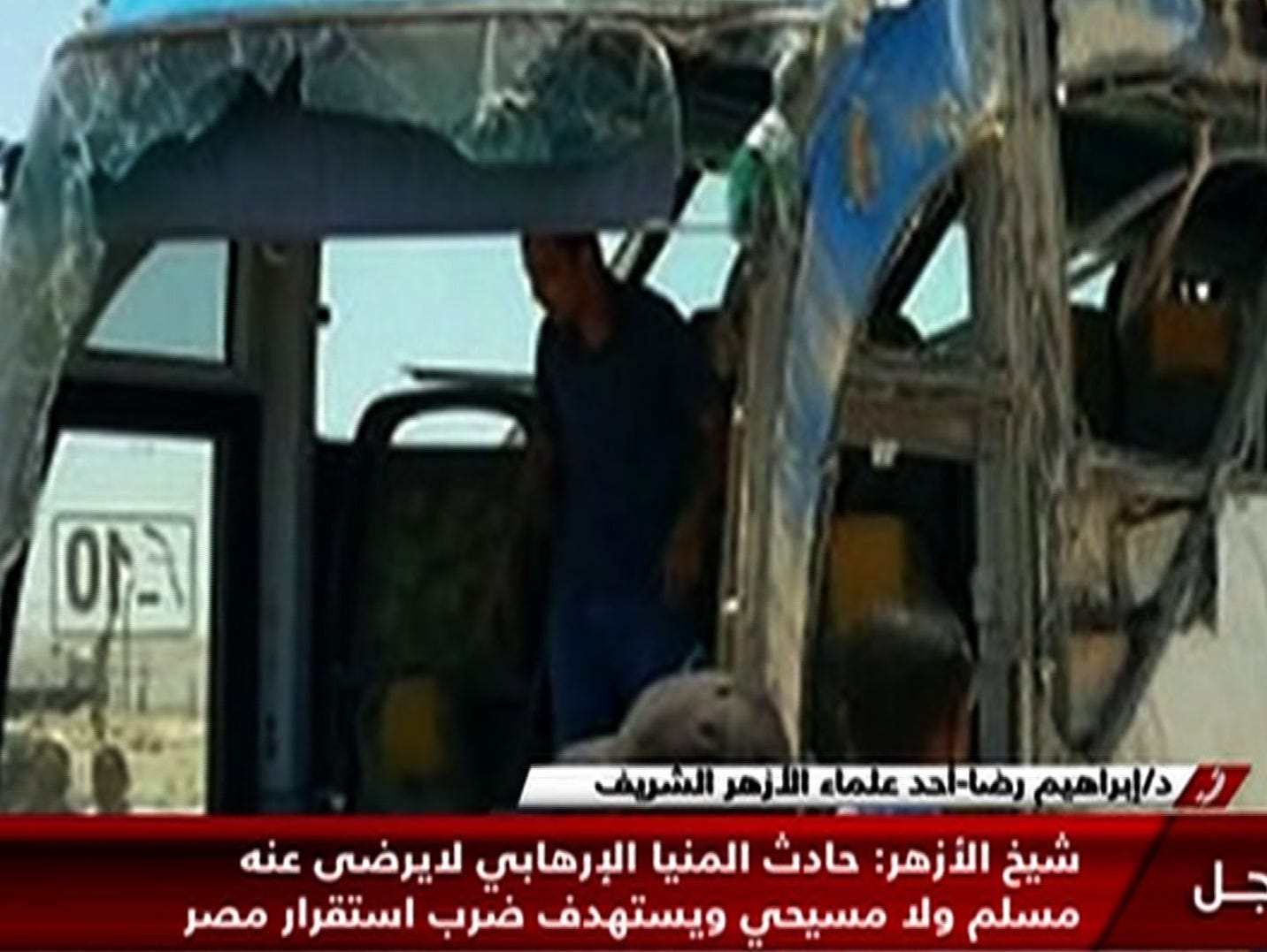 An image grab taken from Egypt's state-run Nile News TV channel on May 26, 2017 shows the remains of a bus that was attacked while carrying Egyptian Christians in Minya province, some 130 miles south of the capital Cairo, killing dozens people accord