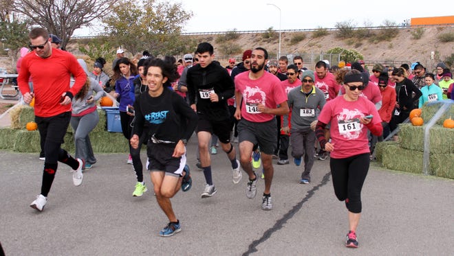 Runners are off at the 14th annual Ultimate Fitness Trkey Trot held at 8 a.m. on Thanksgiving Day 2016. Over 240 people took part in the annual event held at Voiers "Pit" Park in Deming.