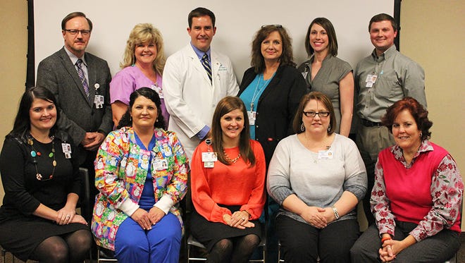 Pictured are managers at Hattiesburg Clinic whose departments participated in the Stage 7 process. Front row, from left: Tasha Porter, MPH (HIM), Lana McDaniel (The Breast Center), Julie Russum (Pulmonary Medicine), Leslie Swilley (The Pediatric Clinic), and Betty Dickerson (EpicCare). Back row, from left: Jerry Robinson (IS), Shelia Morse (PlasticSurgery), Bryan Batson, MD (Hypertension Center), Lisa Grantham (Hypertension Center), Logan Brenner (The Pediatric Clinic), and Jamey Davion (Quality Management).