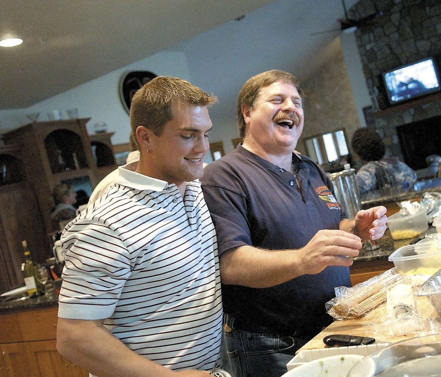 Capt. Rick Quashnick, right, with boat engineer Blake Painter of the crab-fishing vessel Maverick, in April 18, 2006. The Discovery Channel series 