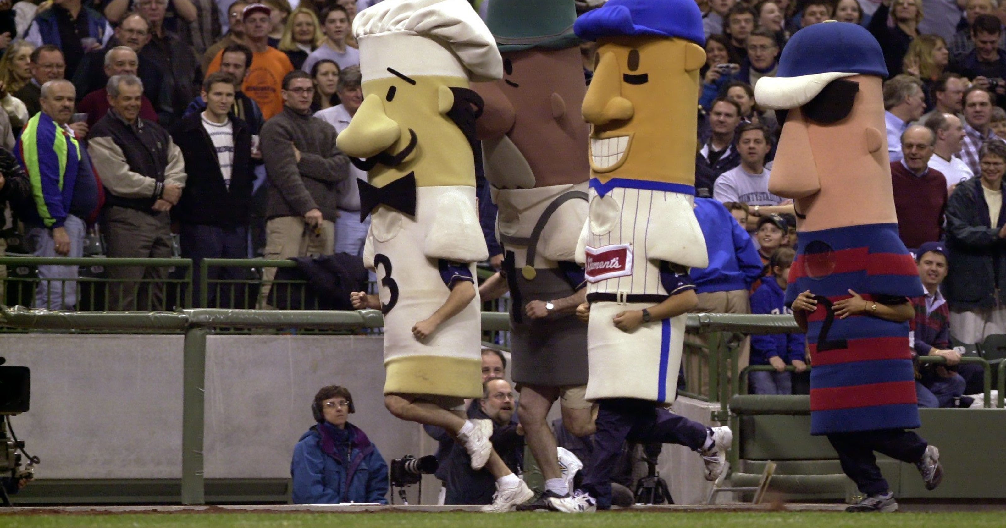 Three Johnsonville Racing Sausages take a fall during Tuesday's race